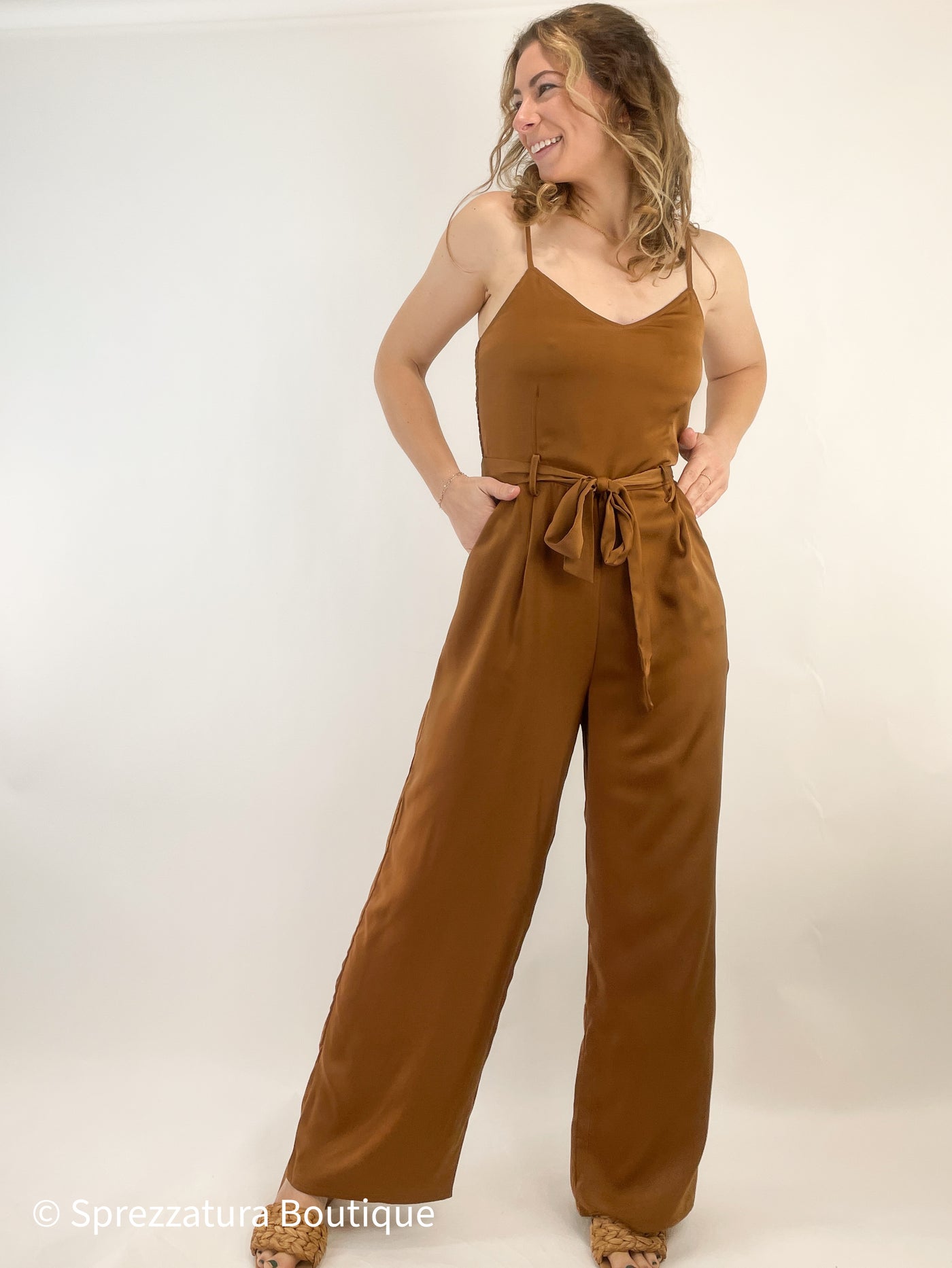 Cognac brown copper satin jumpsuit wide leg tie waist adjustable strap wedding guest holiday party concert special event outfit flattering comfortable Modern smart causal female chic effortless outfit womens ladies gift elegant effortless clothing everyday stylish clothes apparel outfits chic winter fall autumn professional style women’s boutique trendy teacher office cute outfit boutique clothes fashion quality work from home neutral wardrobe essential basics lounge athleisure gift for her 
