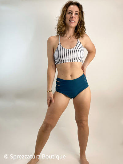 Teal bottoms with a black and white striped top for this summer swimsuit bikini. Women's two piece bathing suit with tie back but still has coverage.