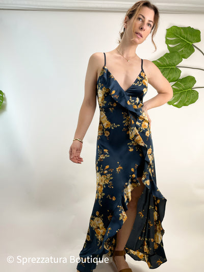 Navy dress with yellow roses floral pattern on satin. Dark blue dress with high slit and ruffle. Open back dress for wedding guest, special occasion, or event. Dressy women's formal dress.