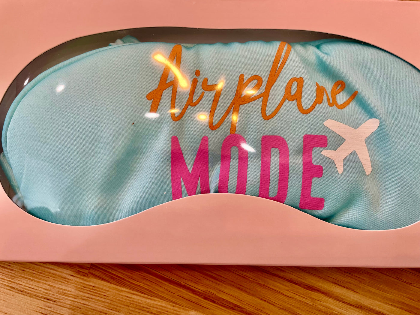 Eye masks to help you relax and block out light. Stain eye masks that say different things: -Rosé Si'l Vous Plait in black  -Airplane Mode in robins egg blue  -Breakfast at Tiffany's Eyelashes in blush pink