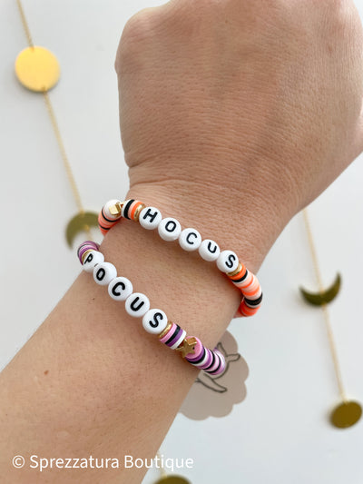 locally made woman-owned business handmade bracelets pair hocus pocus stack heishi bead style stars halloween jewelry bracelet orange purple 