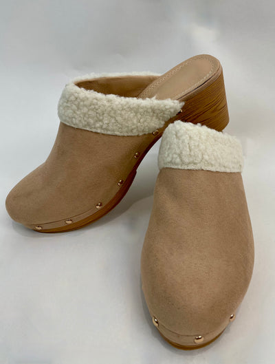 Nude pink faux suede and faux fur clogs.