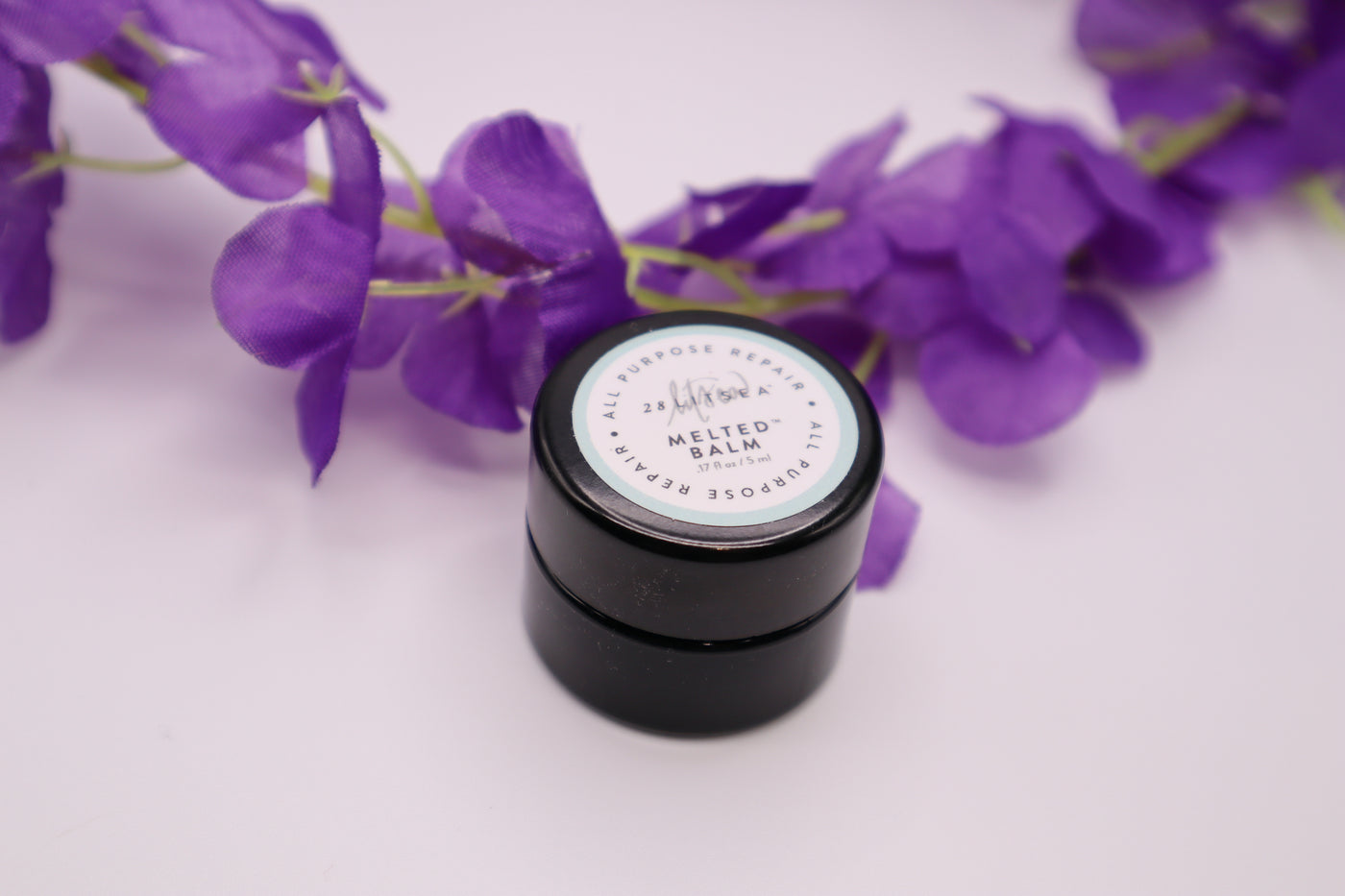 Melted balm is all natural by a small woman owned brand  local to Massachusetts. Use for very chapped lips or cuticles or even as a lip primer before adding to lipstick.