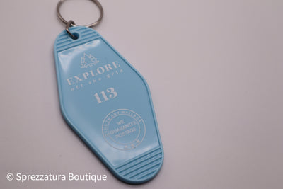 Vintage postage stamp keychain. Retro motel keychain light blue. Makes a great gift