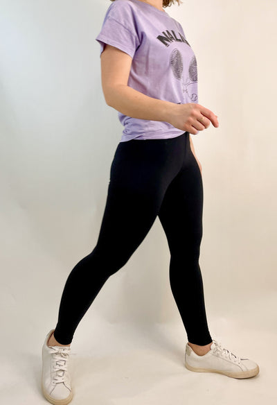 Black athletic leggings that can be worn to work out in or to work. We love that they are made in the USA with sustainable materials and by a woman run business. Compression helps with recovery.