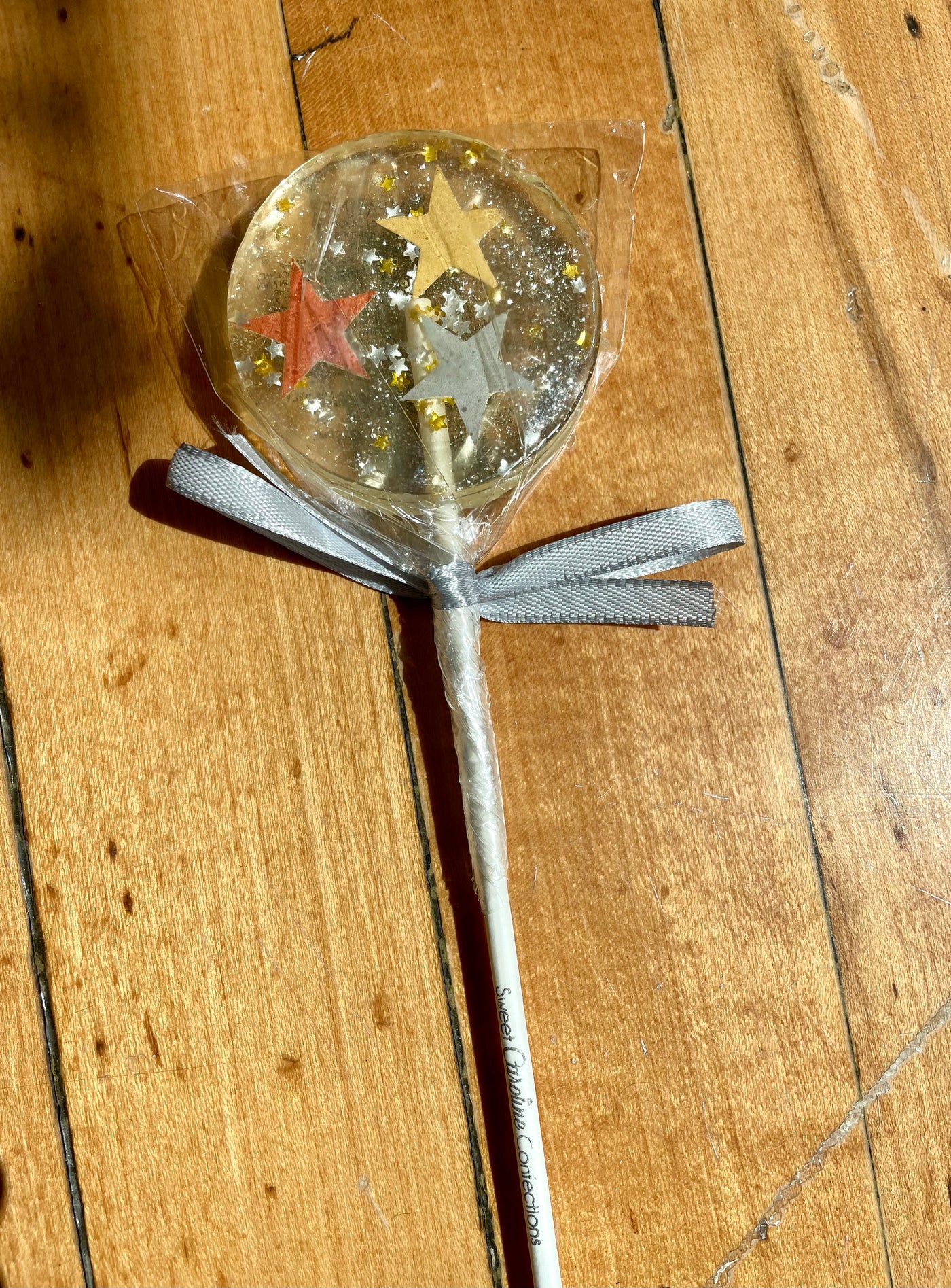 Gourmet champagne lollipop with sprinkles. Gift.